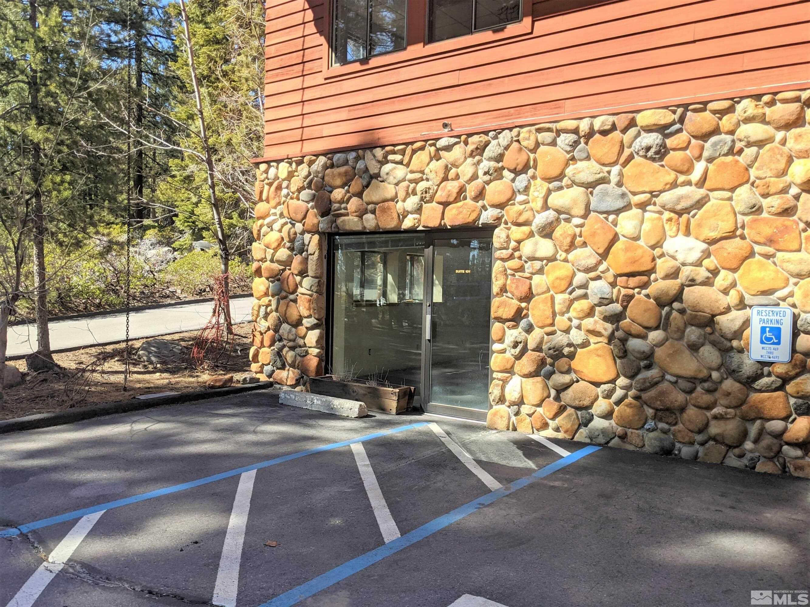 889 Alder Avenue, Unit 101 Incline Village, NV 89451 - Photo 5 of 8 a view of garage with a car parked beside it