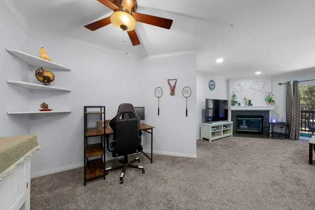 a kitchen with stainless steel appliances granite countertop a stove top oven a refrigerator a sink and dishwasher with a dining table