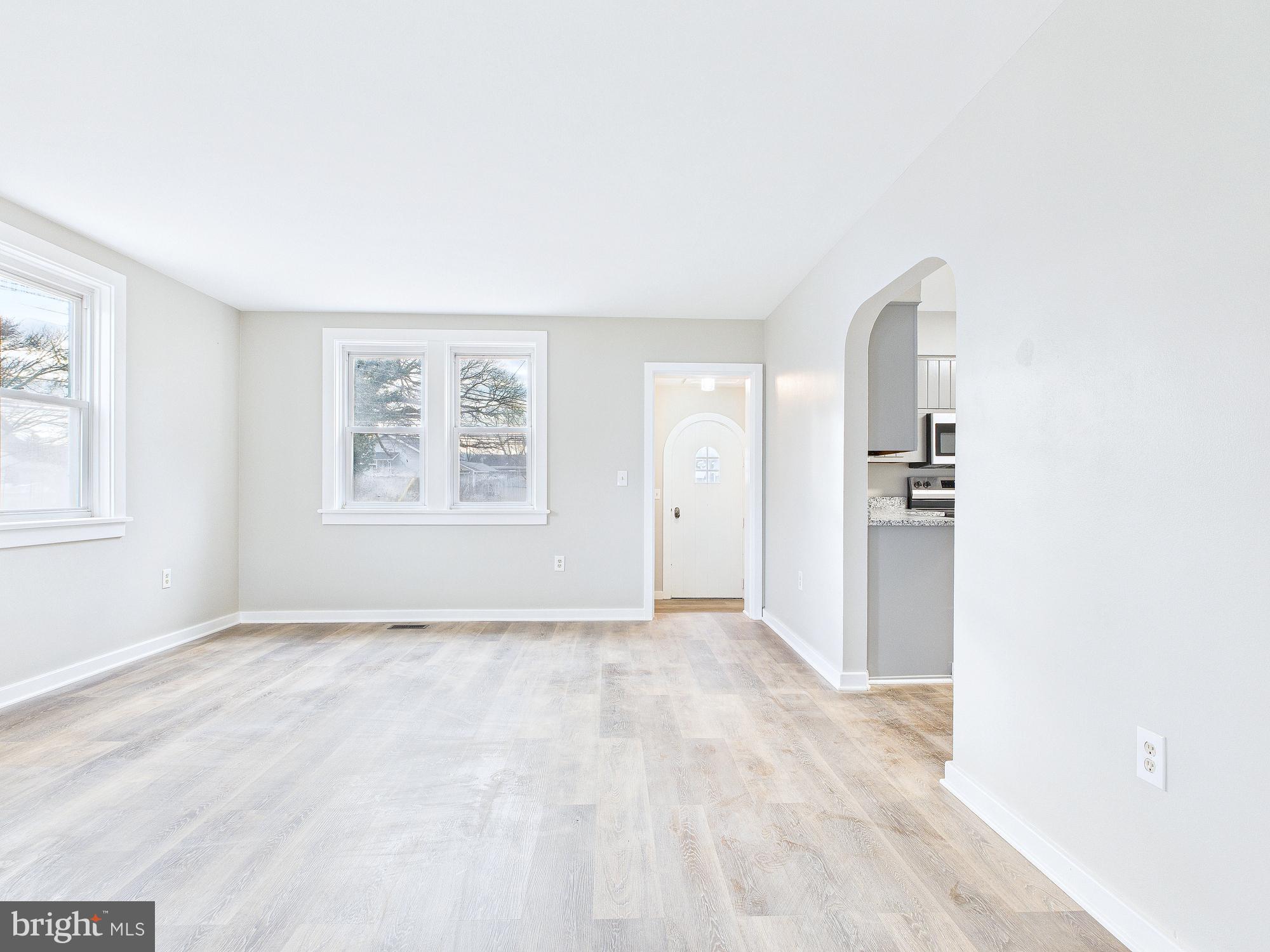 312 Market Street Highspire, PA 17034 - Photo 16 of 38 a view of an empty room with a window