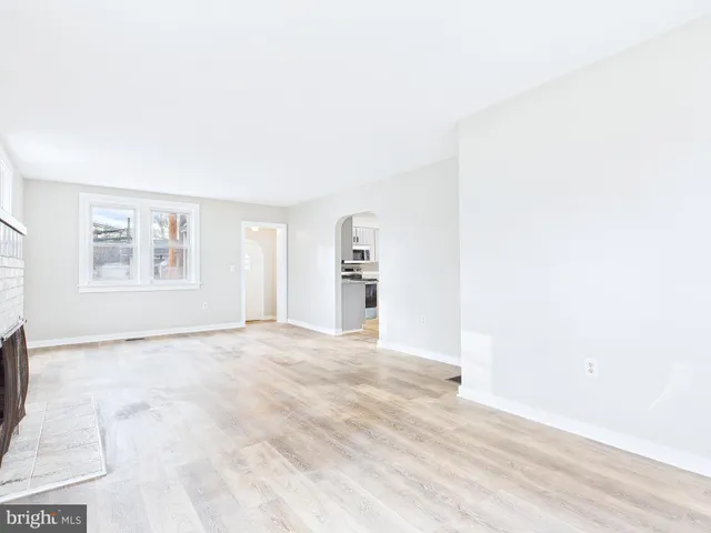 a bathroom with a sink a toilet and bathtub
