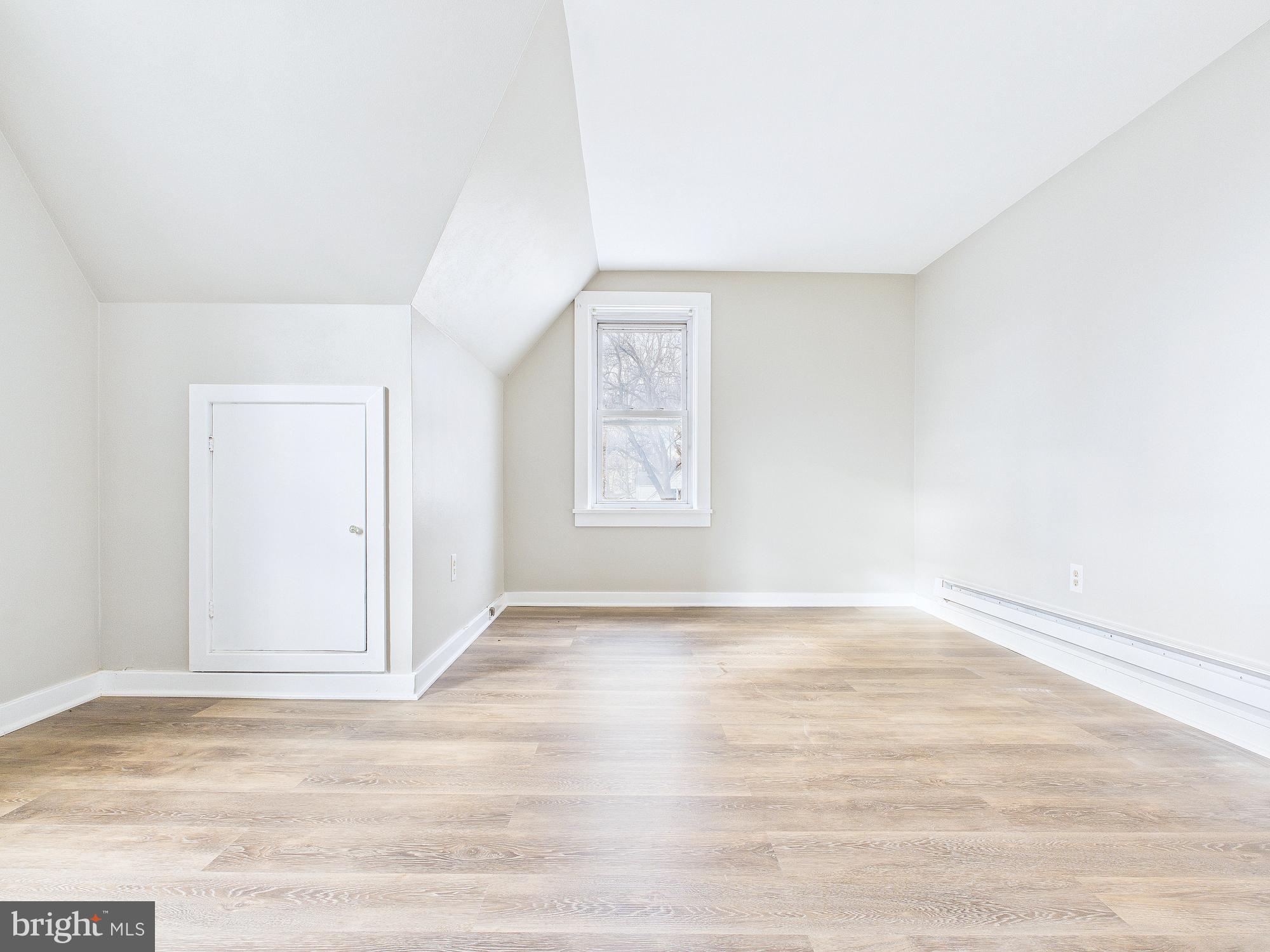 312 Market Street Highspire, PA 17034 - Photo 35 of 38 a view of an empty room with a window