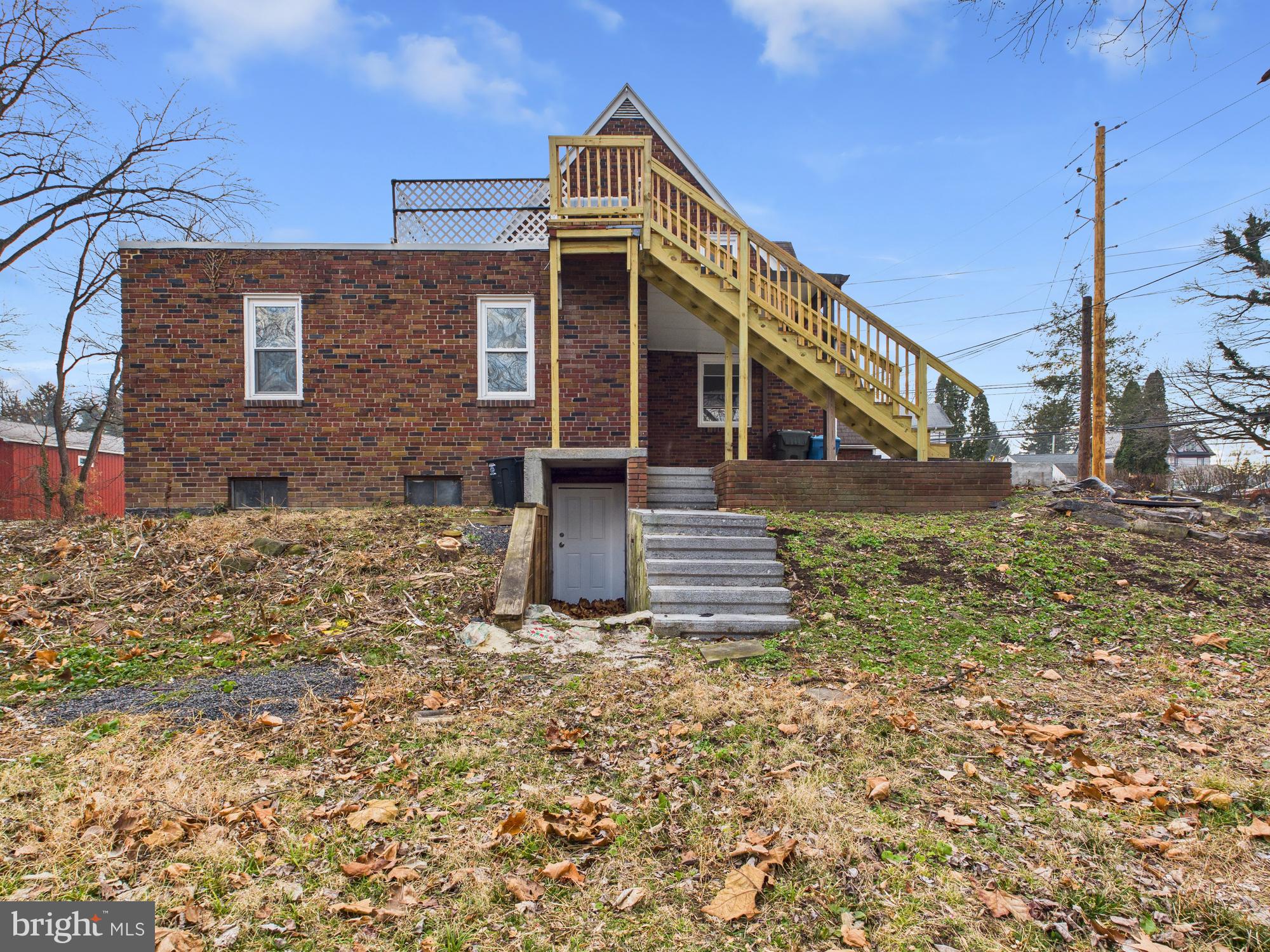 312 Market Street Highspire, PA 17034 - Photo 6 of 38 a front view of a house with a yard