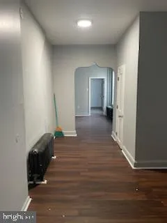 a view of a livingroom with wooden floor