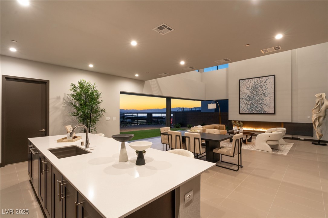 36 Rainbow Point Place Henderson, NV 89011 - Photo 4 of 22 Gourmet kitchen with amazing flow into the great room for entertaining.