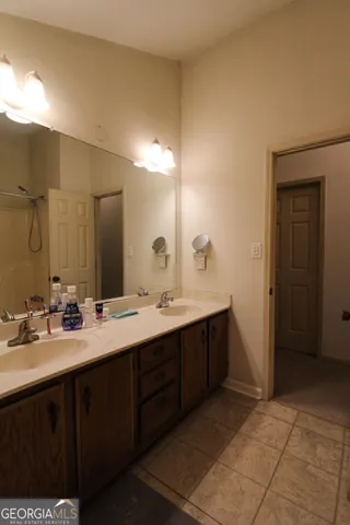 an empty room with closet area