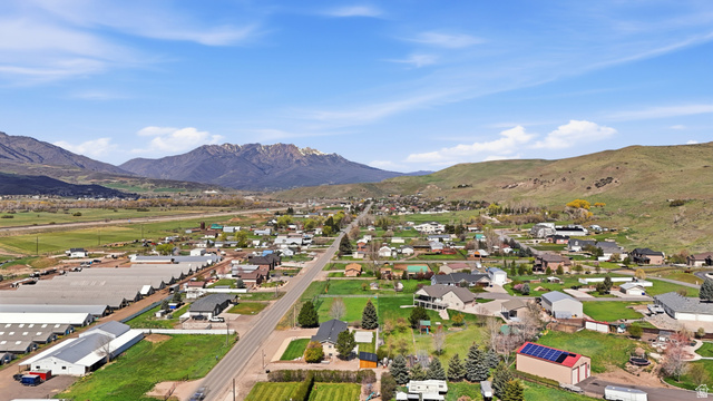2420 West Old Hwy Road Morgan, UT 84050 - Photo 7 of 54 Aerial view of residential area featuring a mountain backdrop