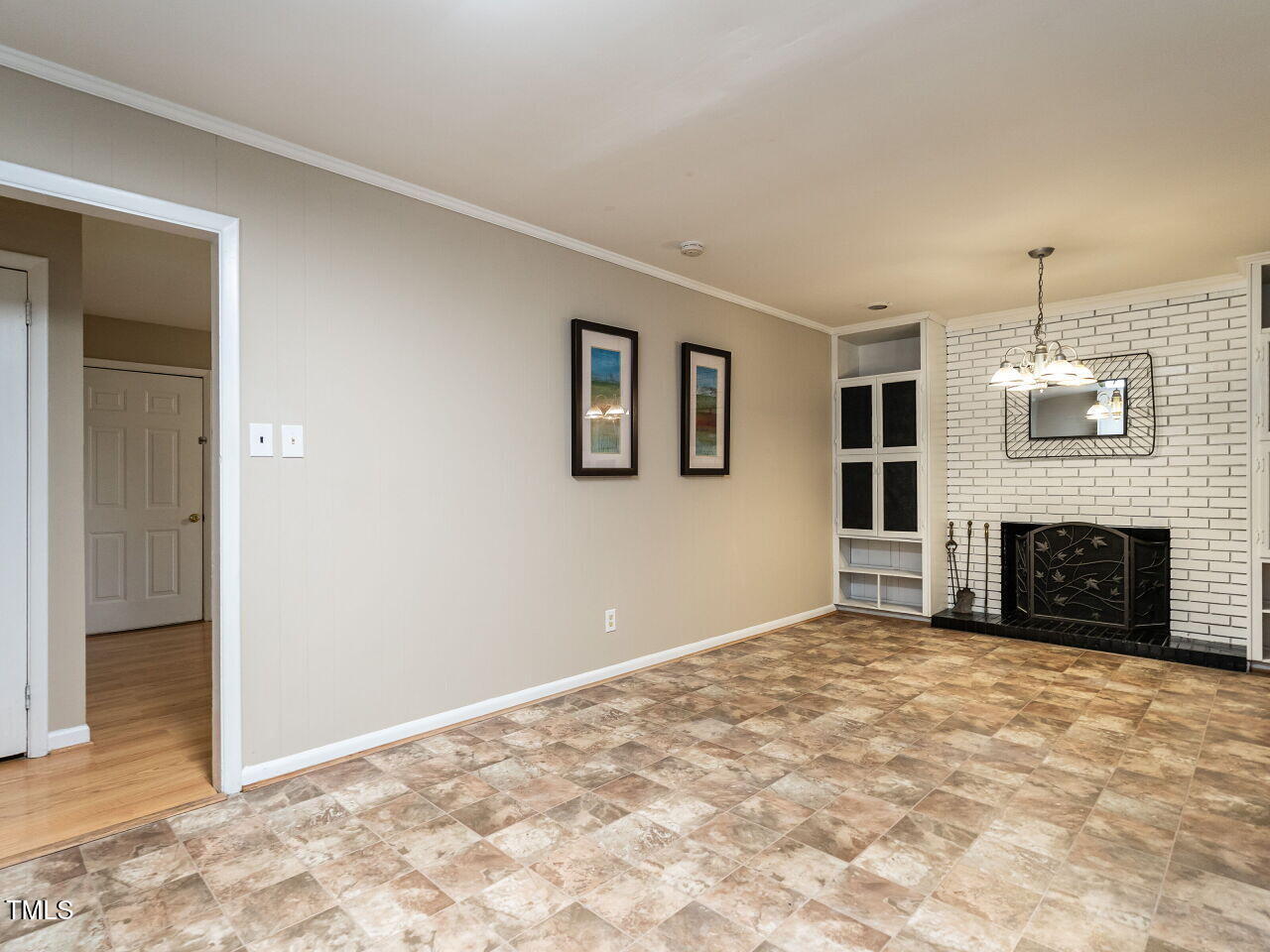 829 Greenwich Street Raleigh, NC 27610 - Photo 13 of 29 a view of a livingroom with a fireplace
