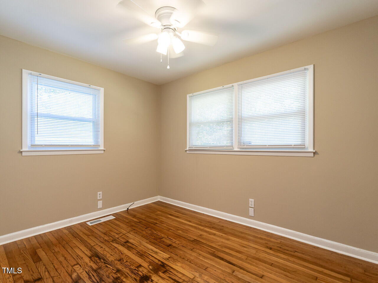 829 Greenwich Street Raleigh, NC 27610 - Photo 23 of 29 a view of a room with wooden floor and closet