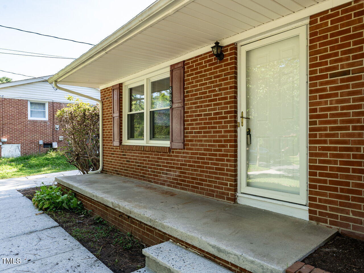 829 Greenwich Street Raleigh, NC 27610 - Photo 7 of 29 a view of a house with a yard