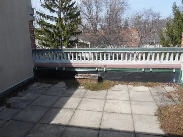 a view of a swimming pool with patio
