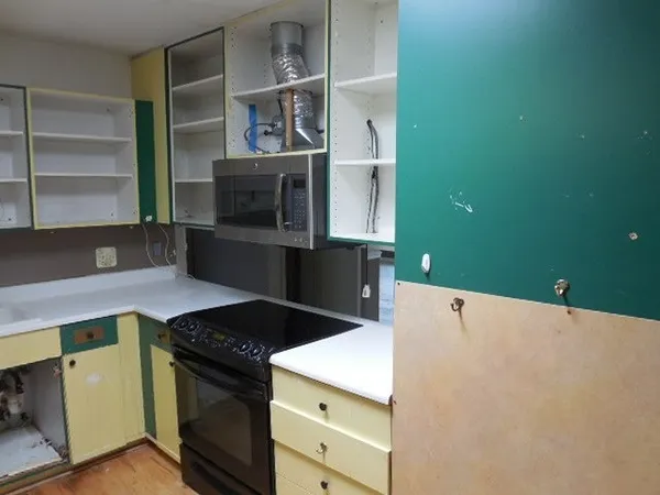 a kitchen with a cabinets and a stove