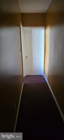 a room with chairs and a table