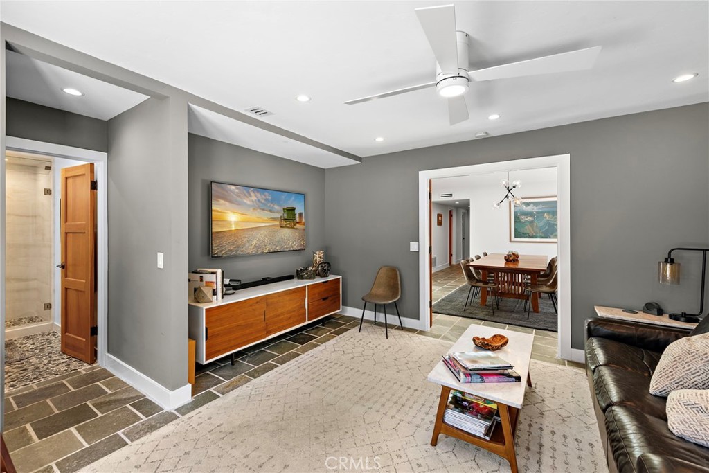 3085 Nestall Road Laguna Beach, CA 92651 - Photo 13 of 33 a living room with furniture and a flat screen tv