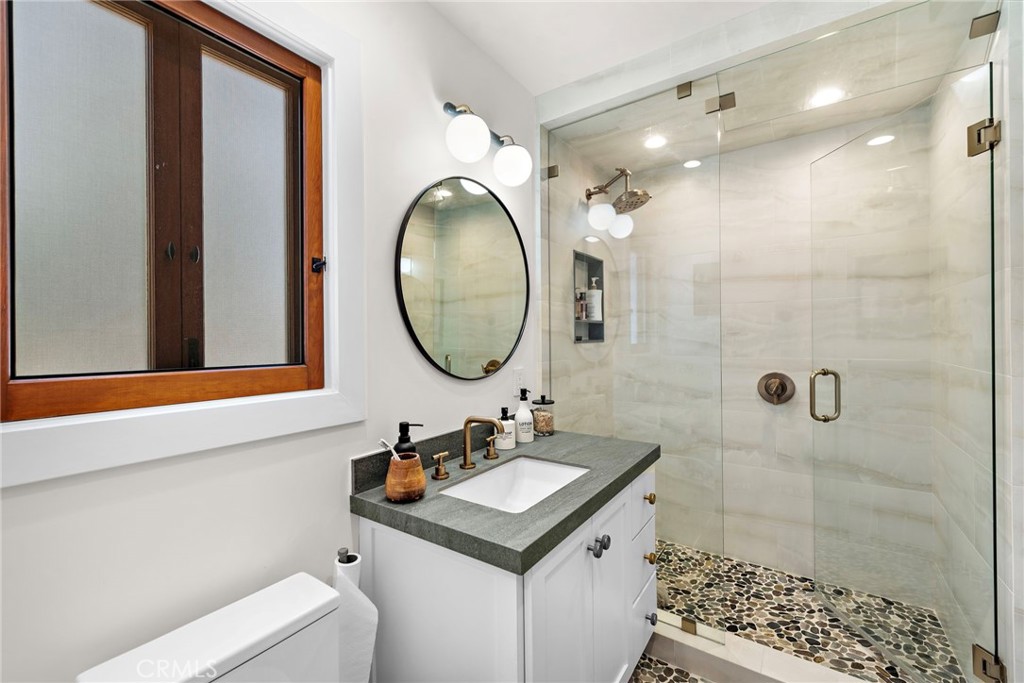 3085 Nestall Road Laguna Beach, CA 92651 - Photo 16 of 33 a bathroom with a sink toilet and shower