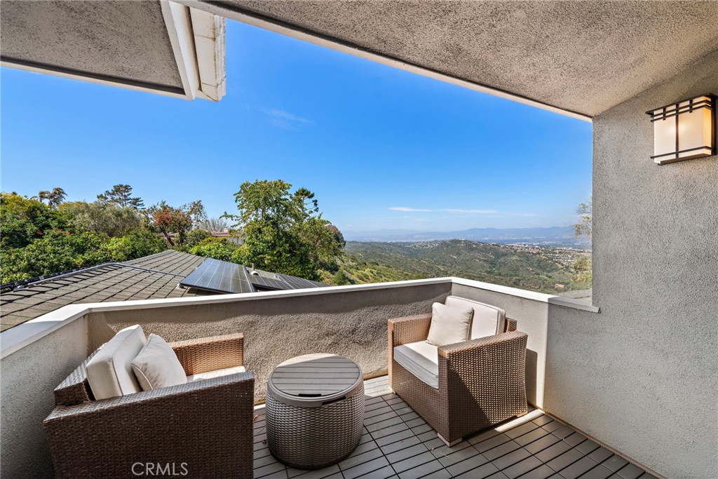 3085 Nestall Road Laguna Beach, CA 92651 - Photo 22 of 33 a view of roof deck with chairs and wooden fence