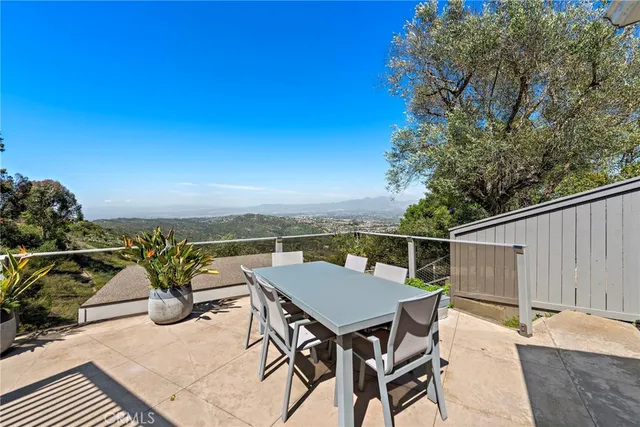 a view of a patio with swimming pool