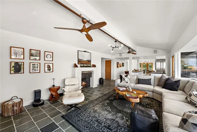 a living room with furniture and a rug