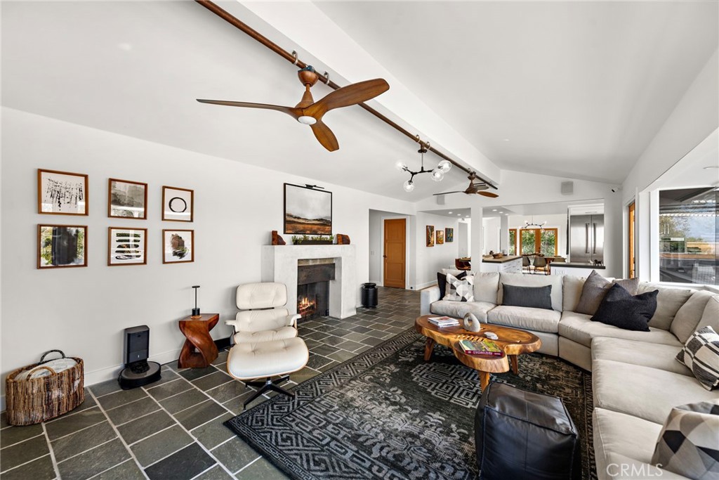3085 Nestall Road Laguna Beach, CA 92651 - Photo 6 of 33 a living room with furniture and a rug
