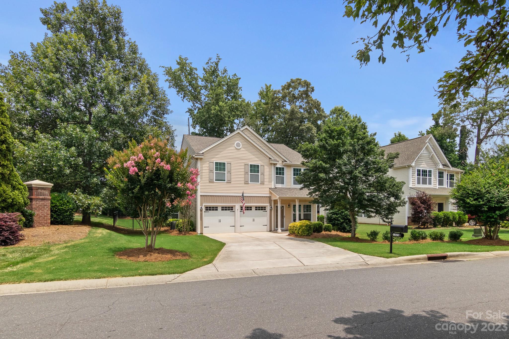 7228 Meyer Road Fort Mill, SC 29715 - Photo 2 of 45 a view of house and outdoor space with trees around