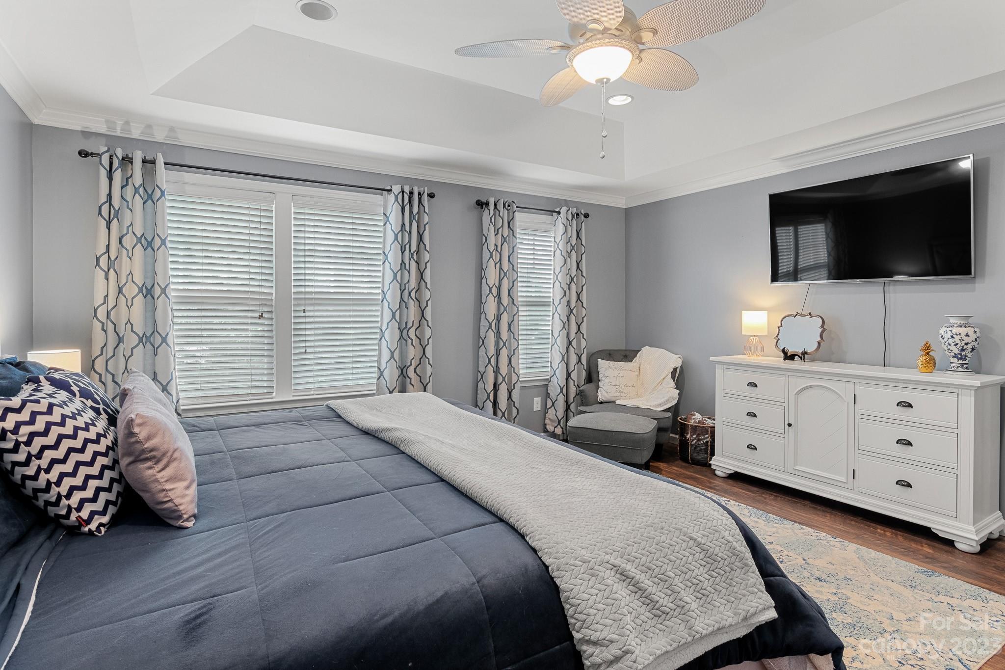 7228 Meyer Road Fort Mill, SC 29715 - Photo 25 of 45 a bedroom with a large bed and flat tv screen