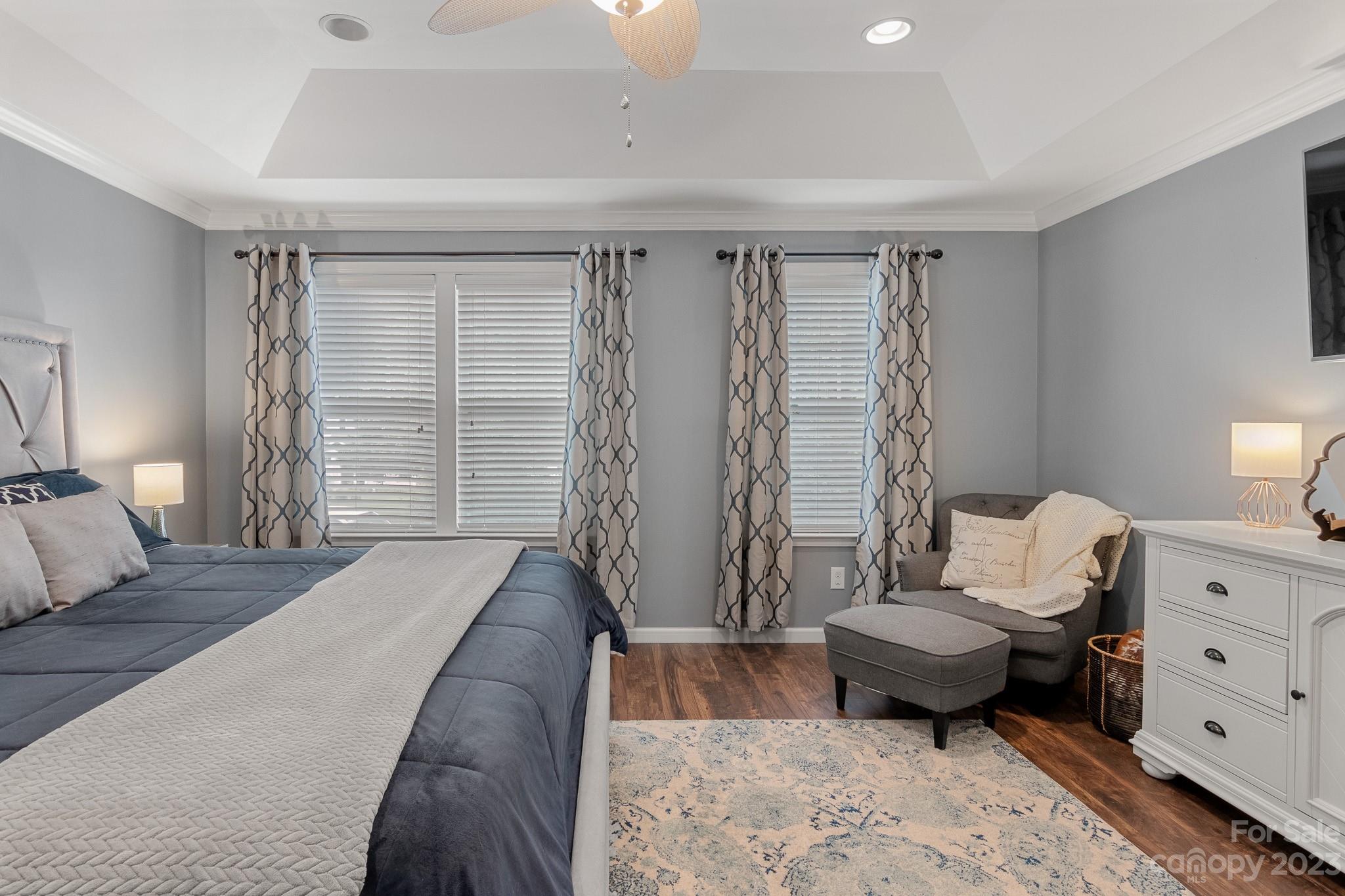 7228 Meyer Road Fort Mill, SC 29715 - Photo 26 of 45 a bedroom with furniture and wooden floor