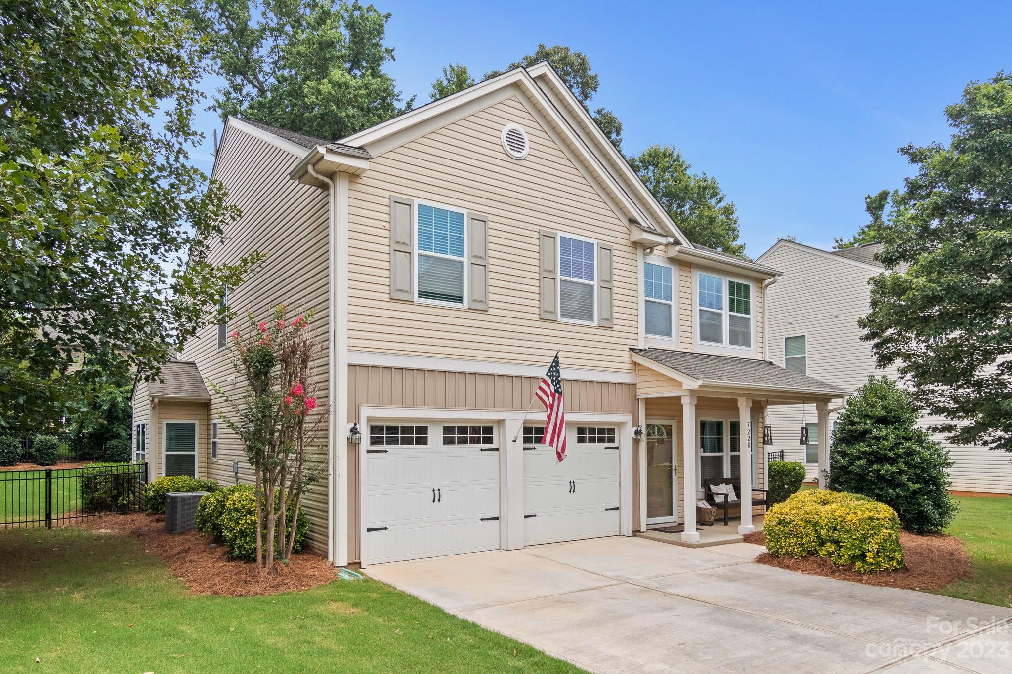 7228 Meyer Road Fort Mill, SC 29715 - Photo 3 of 45 a view of a house with a yard and sitting area