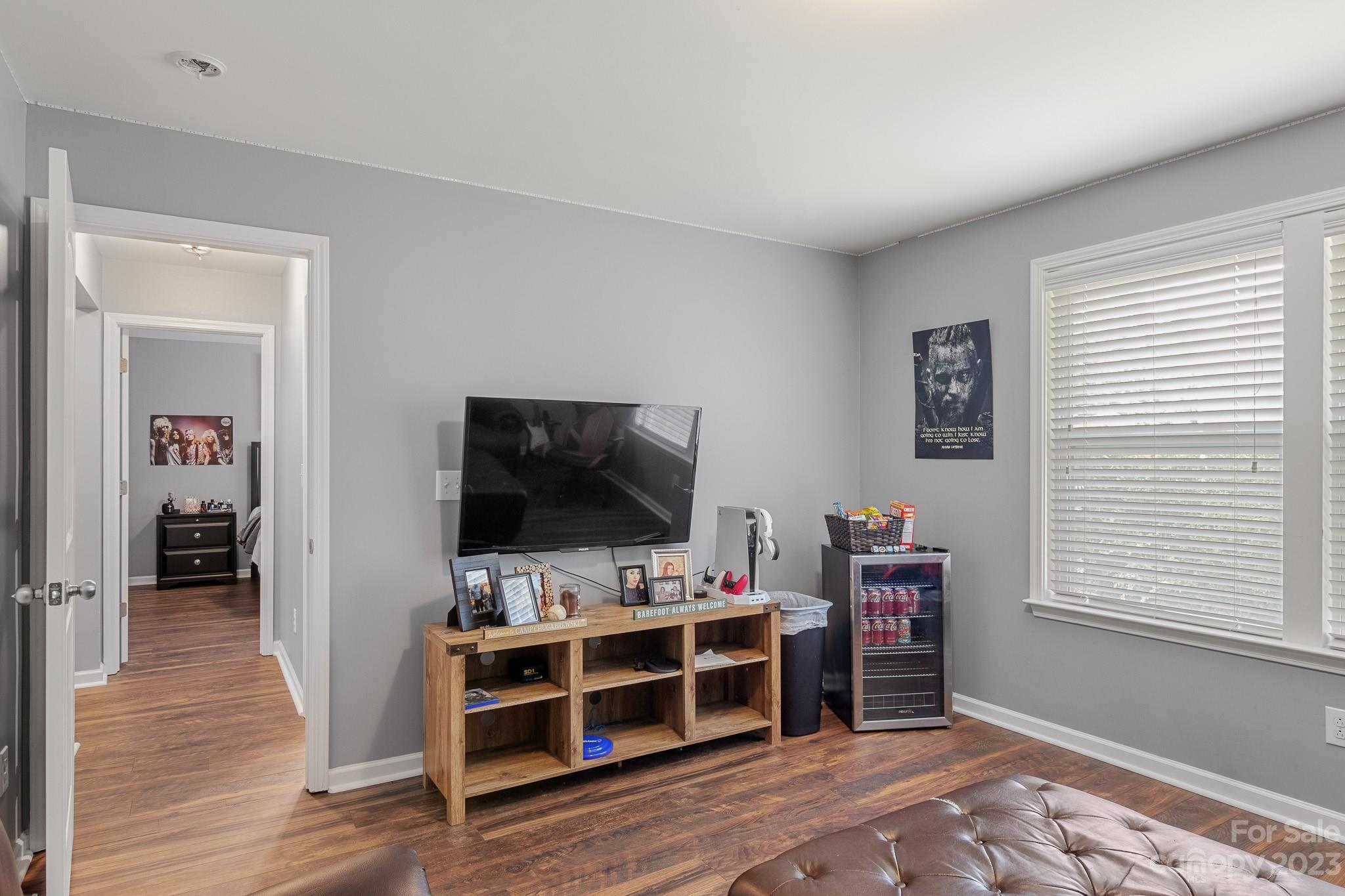 7228 Meyer Road Fort Mill, SC 29715 - Photo 38 of 45 a room with furniture and flat screen tv