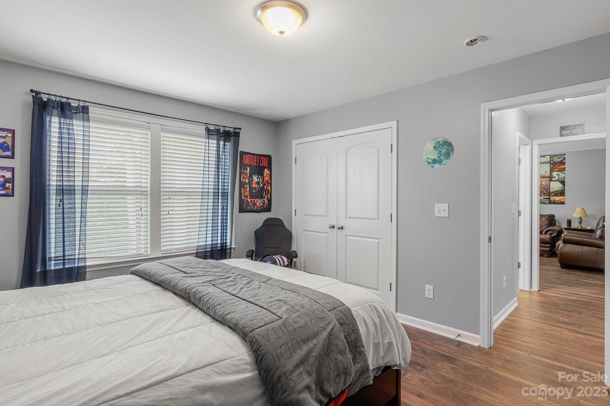 7228 Meyer Road Fort Mill, SC 29715 - Photo 40 of 45 a bedroom with a bed and a large window