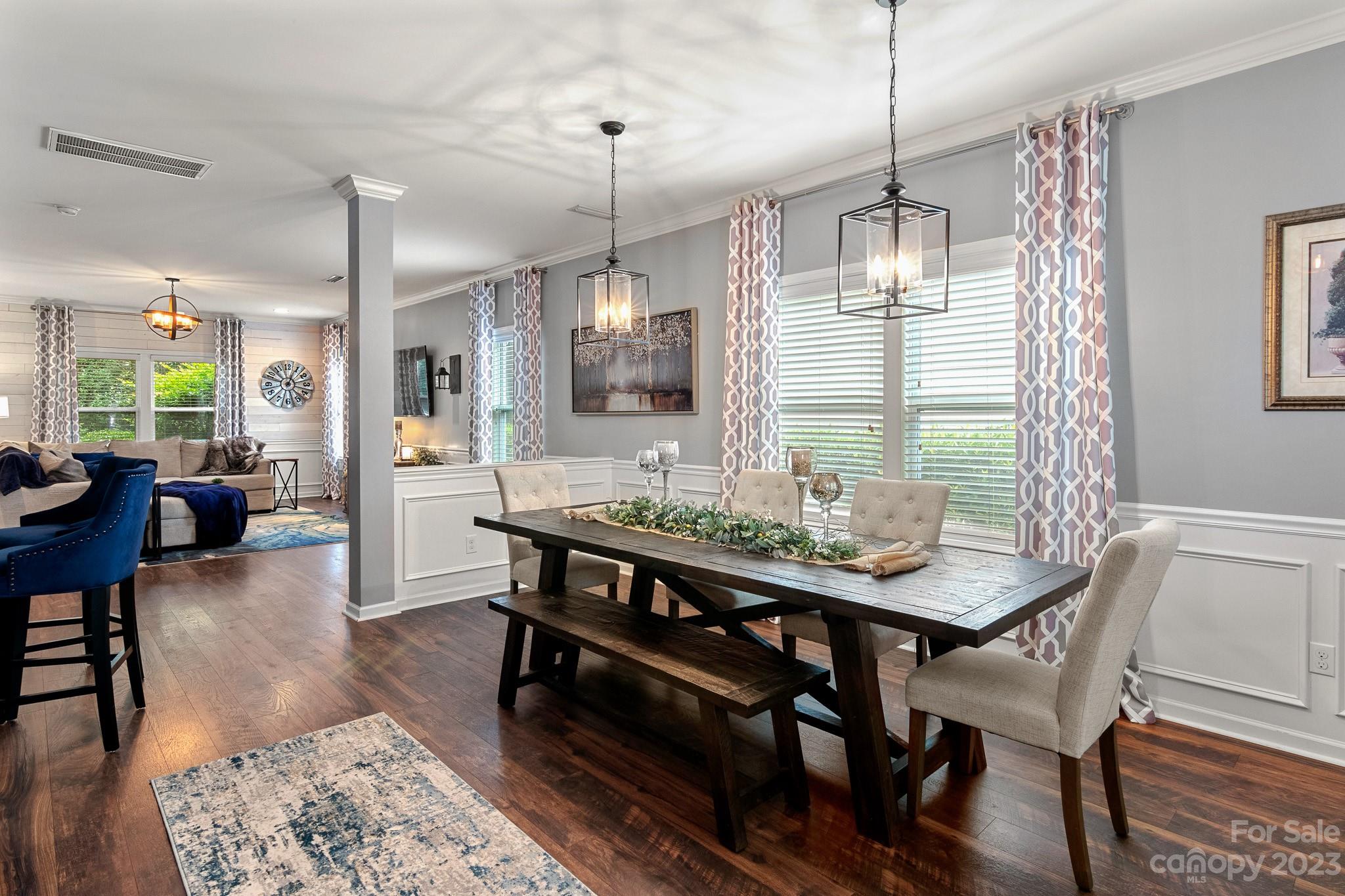 7228 Meyer Road Fort Mill, SC 29715 - Photo 6 of 45 a view of a dining room with furniture window and wooden floor