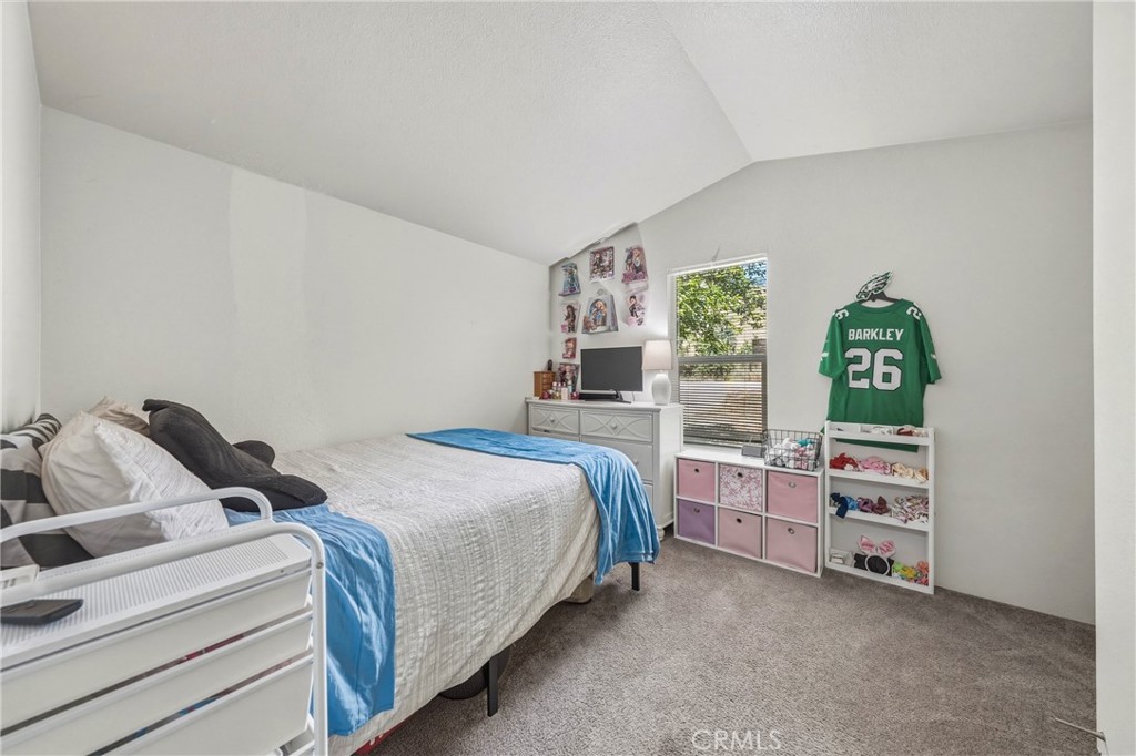 6219 Roland Drive Lucerne, CA 95458 - Photo 14 of 29 a bedroom with a bed and a cabinets