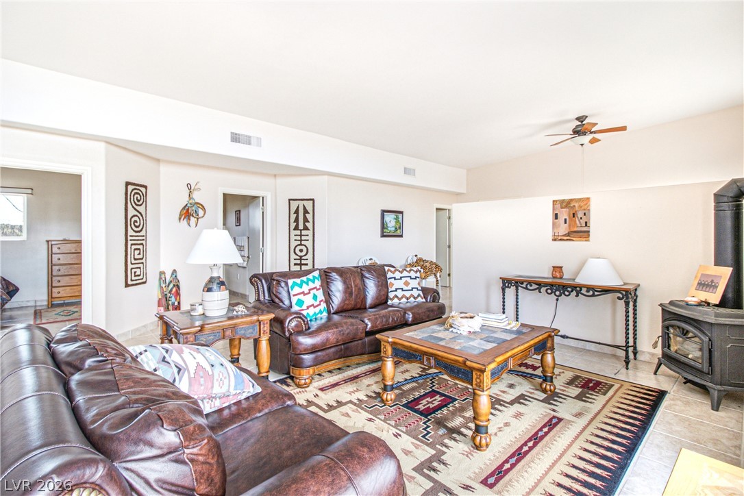 Rocking S Ranch Road Searchlight, NV 89046 - Photo 24 of 47 A spacious common area with a cozy fireplace provides ample room for relaxation and entertainment.