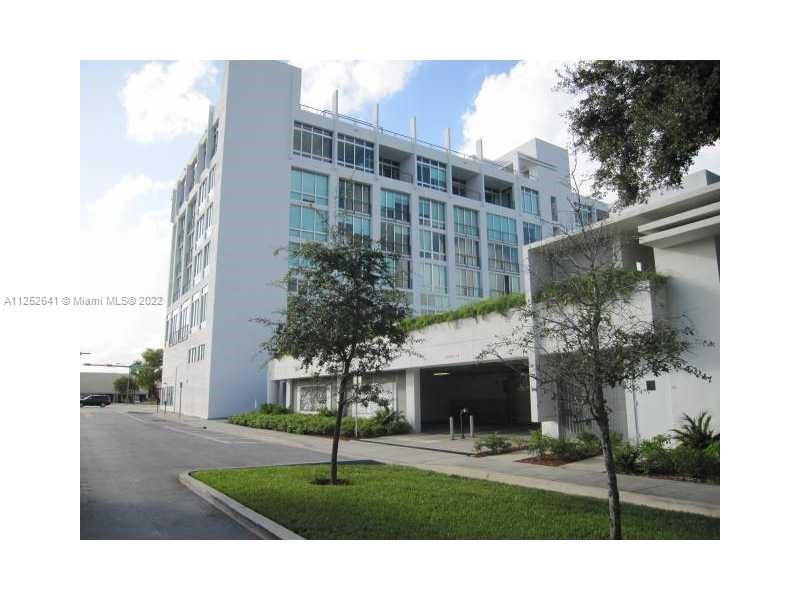 8101 Biscayne Boulevard, Unit R616 Miami, FL 33138 - Photo 29 of 31 a view of building with yard