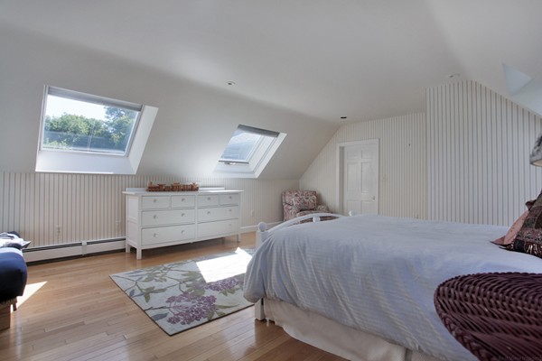 18 Pine Brook Road Wayland, MA 01778 - Photo 16 of 20 a bedroom with a bed and window