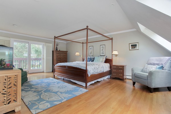 18 Pine Brook Road Wayland, MA 01778 - Photo 19 of 20 a bedroom with a bed and large window