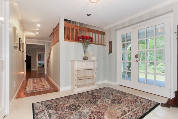 18 Pine Brook Road Wayland, MA 01778 - Photo 2 of 20 a living room with furniture and a rug