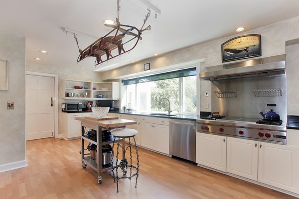 18 Pine Brook Road Wayland, MA 01778 - Photo 3 of 20 a kitchen with stainless steel appliances granite countertop a sink a stove a refrigerator and island with wooden floor