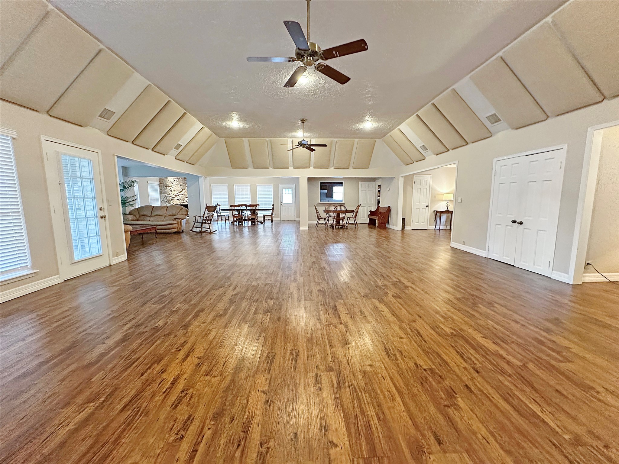 6514 Misty Springs Lane Spring, TX 77379 - Photo 25 of 49 a view of empty room with wooden floor and fireplace