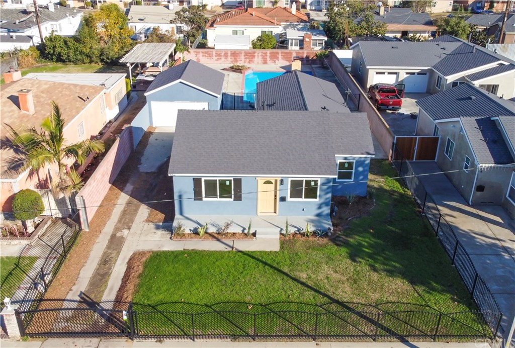706 North Tajauta Avenue Compton, CA 90220 - Photo 12 of 13 an aerial view of residential houses with outdoor space and trees