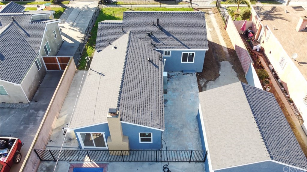 706 North Tajauta Avenue Compton, CA 90220 - Photo 13 of 13 an aerial view of a house with a yard