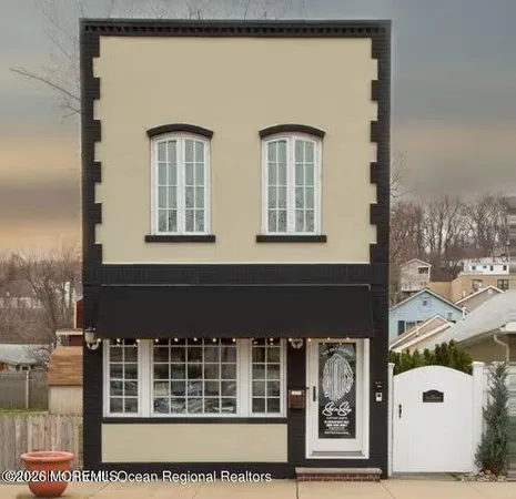 a front view of a house with windows