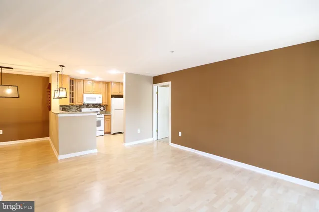 a view of a kitchen with a sink