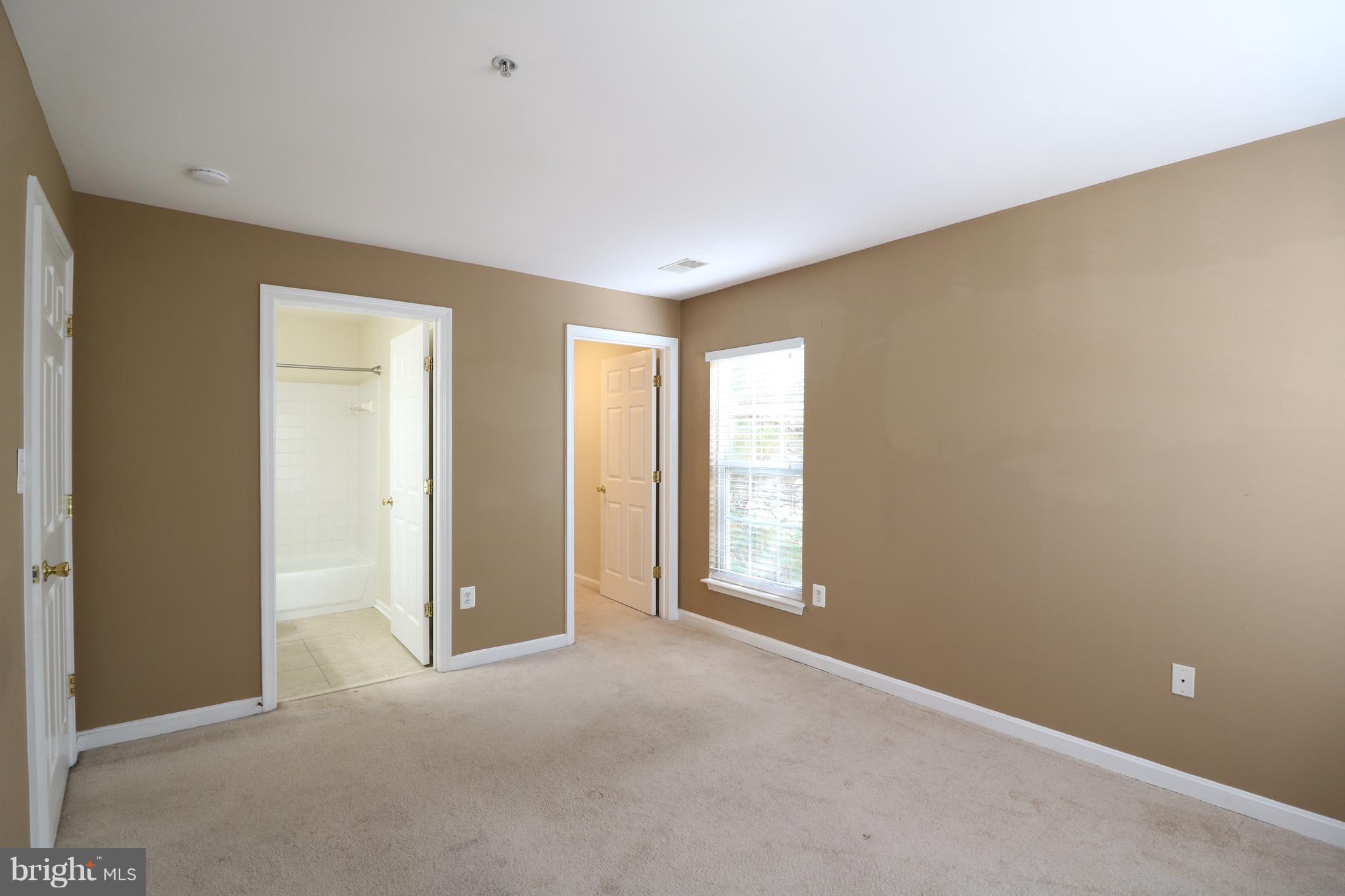 18701 Sparkling Water Drive, Unit 13H Germantown, MD 20874 - Photo 19 of 33 Master Bedroom