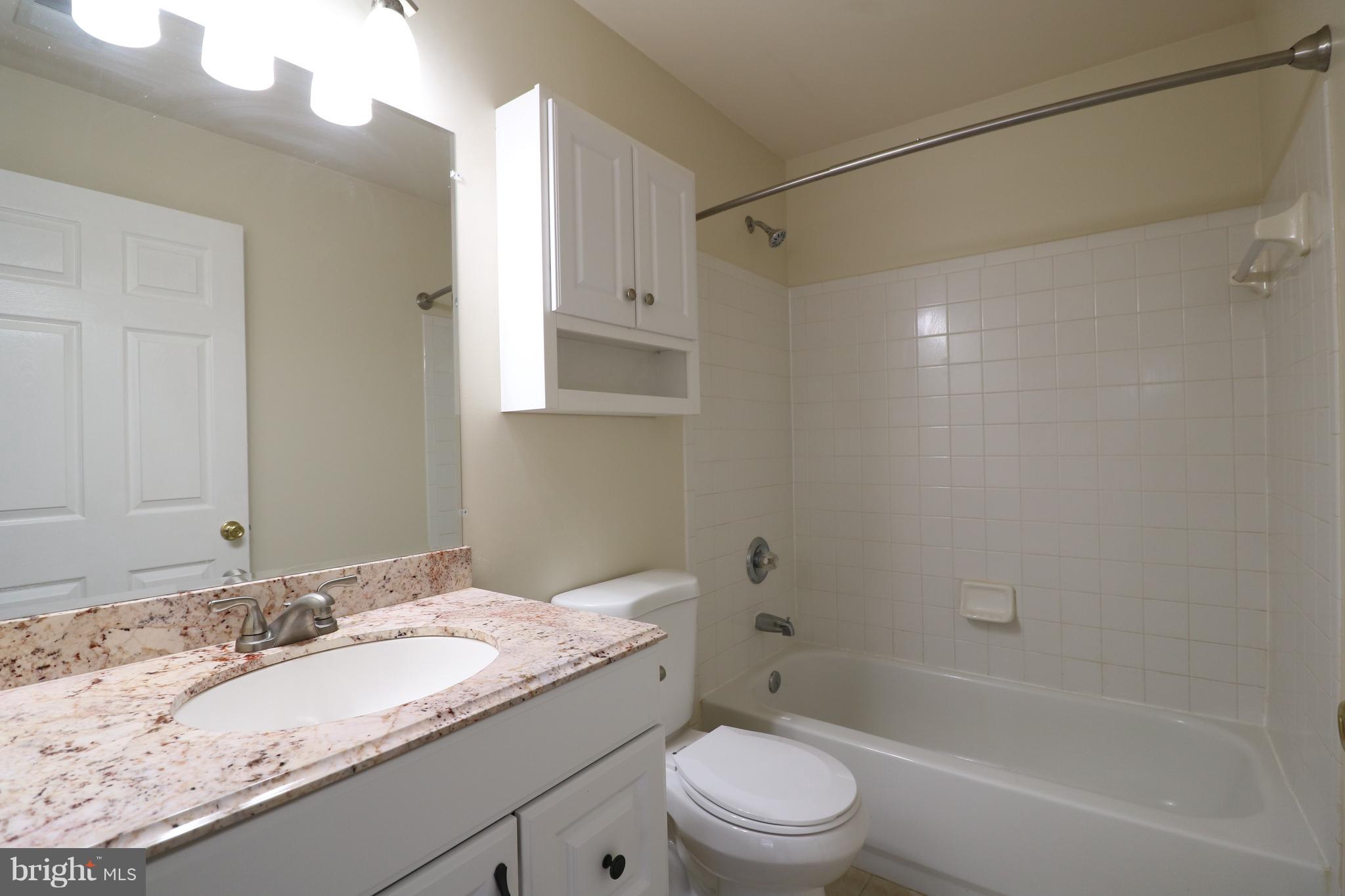 18701 Sparkling Water Drive, Unit 13H Germantown, MD 20874 - Photo 20 of 33 Master Bathroom