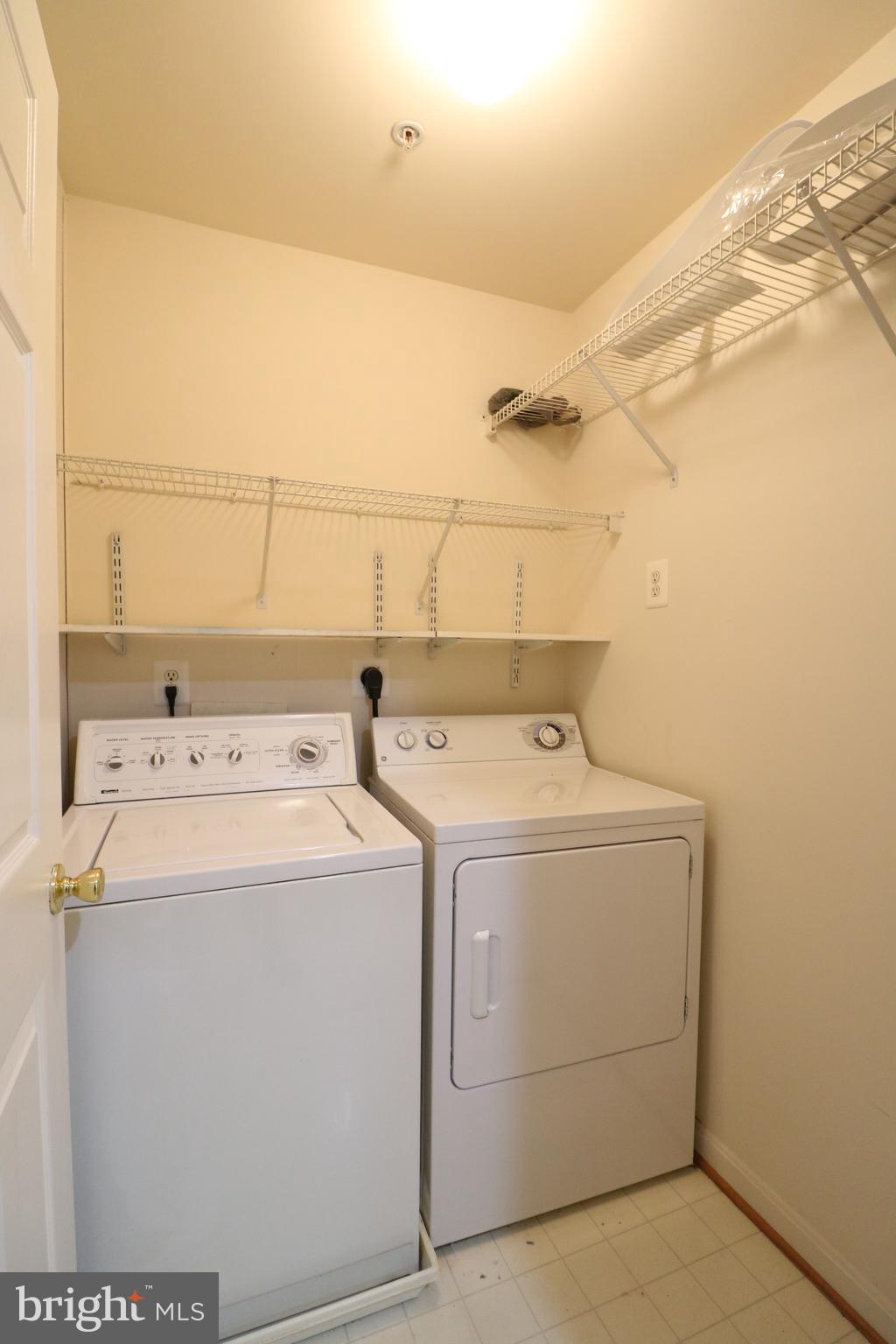 18701 Sparkling Water Drive, Unit 13H Germantown, MD 20874 - Photo 26 of 33 Laundry Room w/room for storage & coats