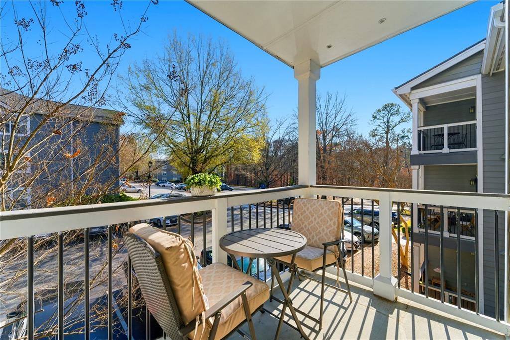 5205 Santa Fe Parkway Sandy Springs, GA 30350 - Photo 11 of 27 a view of a chairs and table on the deck