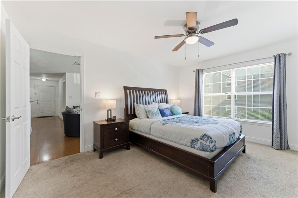 5205 Santa Fe Parkway Sandy Springs, GA 30350 - Photo 13 of 27 a bed sitting in a bedroom and a window