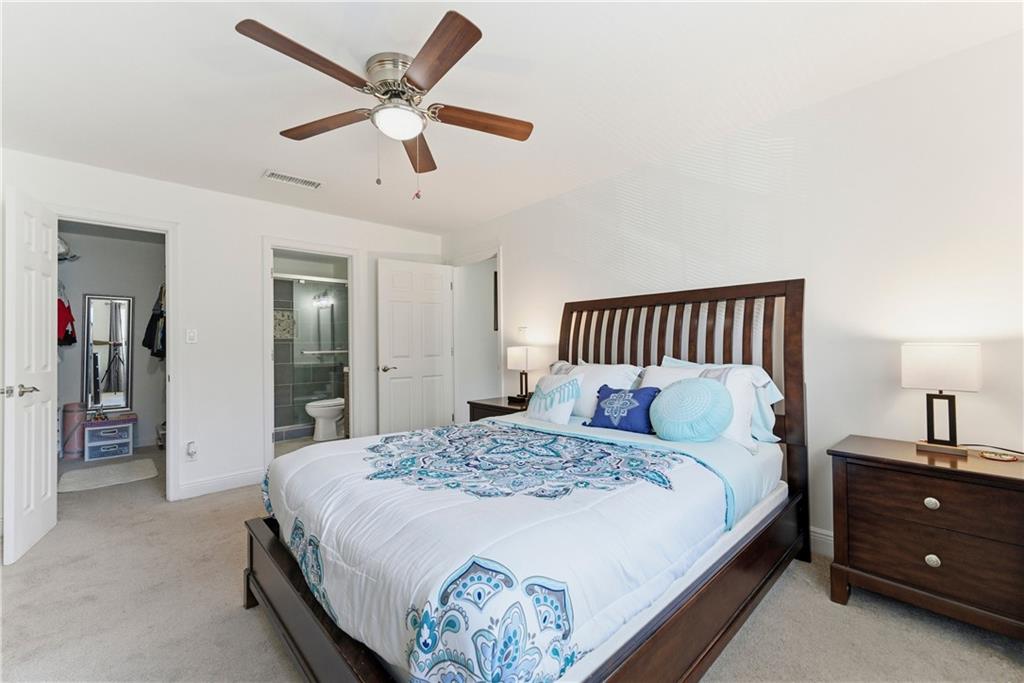 5205 Santa Fe Parkway Sandy Springs, GA 30350 - Photo 15 of 27 a bedroom with a bed and window