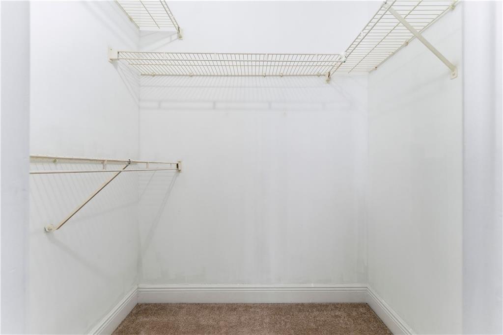 5205 Santa Fe Parkway Sandy Springs, GA 30350 - Photo 21 of 27 a view of a room with racks on the wall