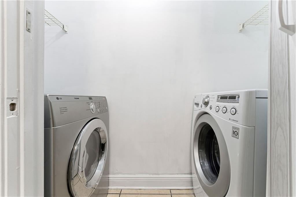 5205 Santa Fe Parkway Sandy Springs, GA 30350 - Photo 6 of 27 a utility room with dryer and washer