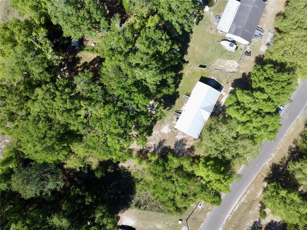 21471 Northwest 172nd Road High Springs, FL 32643 - Photo 22 of 26 an aerial view of a house with a yard and garden